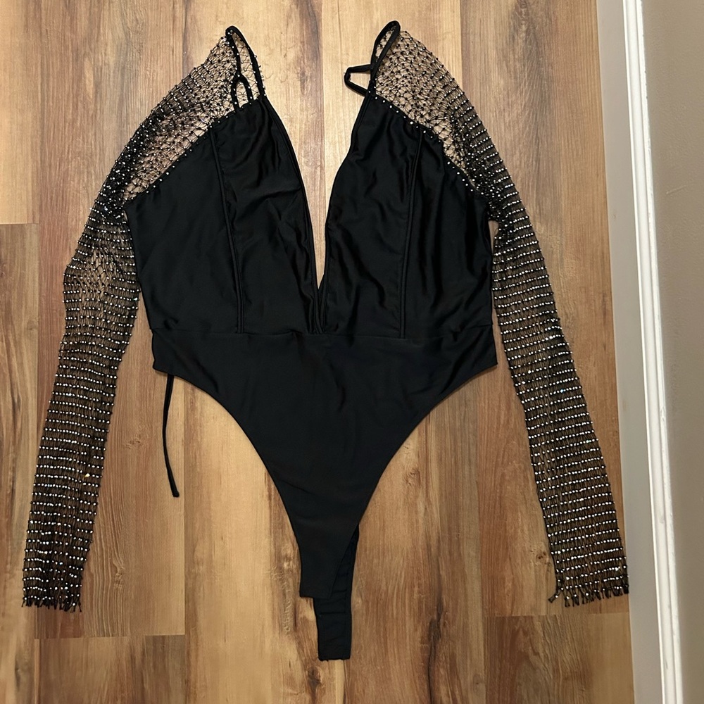 Deep V bodysuit with rhinestone mesh sleeves. 3X
